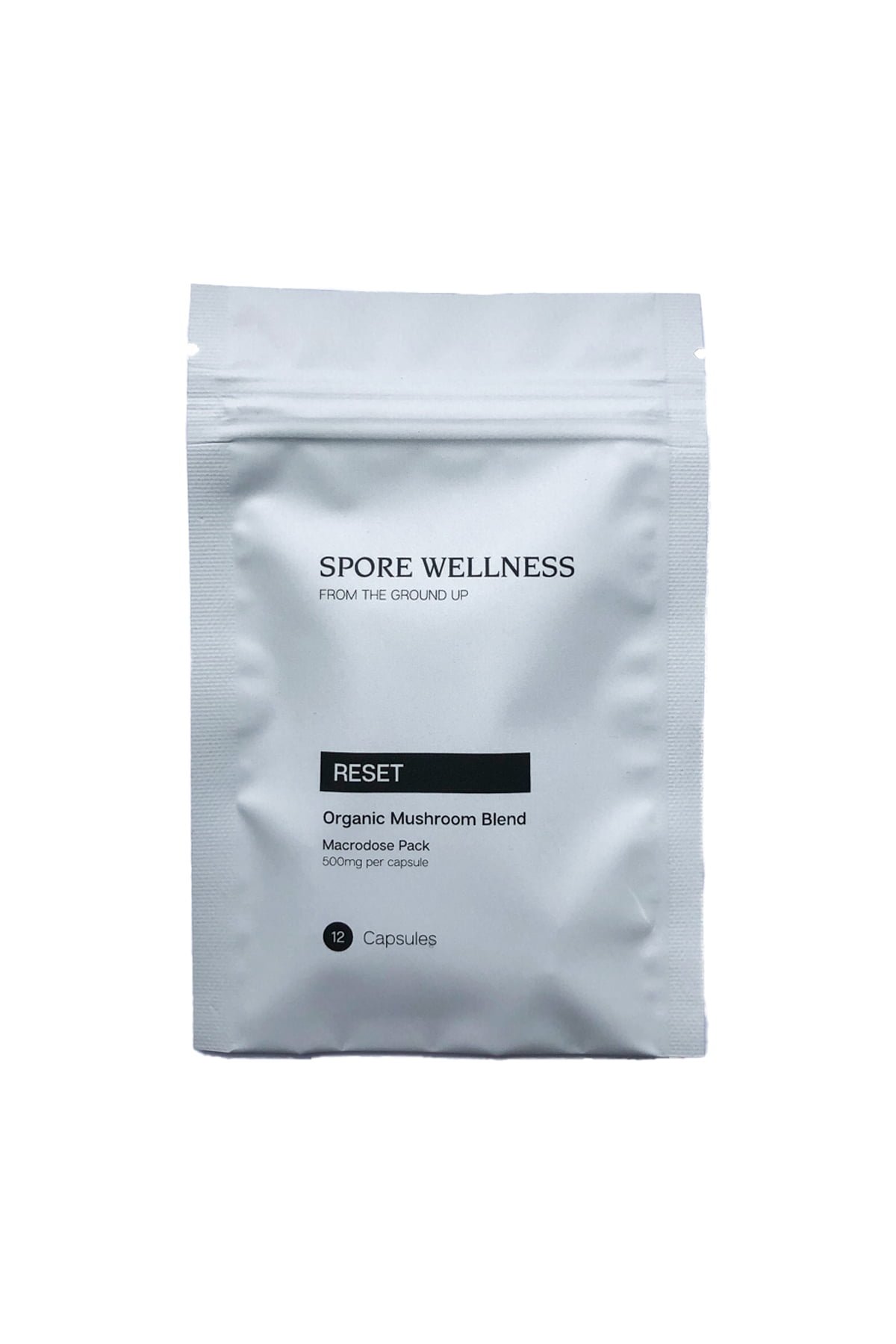 Spore-Wellness-Reset-Macrodosing-Mushroom-Capsules-Front-Bag.jpg